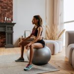 woman on a balance ball during her DIY Functional Fitness Workout