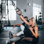 fit blonde woman in the middle of circuit training